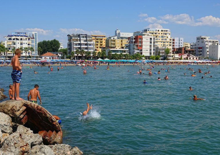 People enjoying themselves on Golem beach, in Durrës, Albania.