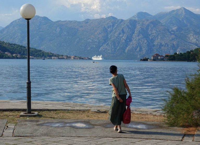 Cruise ship leaving Kotor Bay, and woman with an itch.