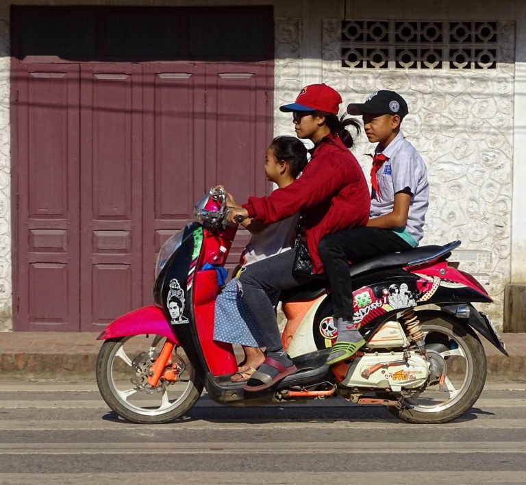 Laotians on a scooter