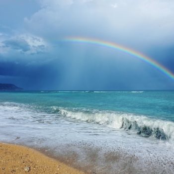 Rough weather with rainbow in Altea on Spain's Costa Blanca.