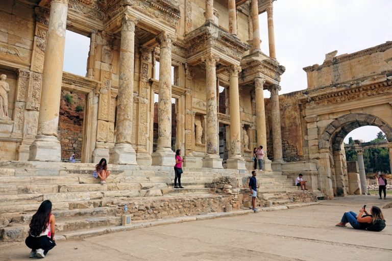 Photo of instagrammers enjoying themselves at the Library of Celsus in Ephesus, Turkey.