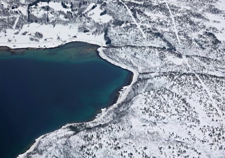 Photo of turquoise water in Lofoten in winter