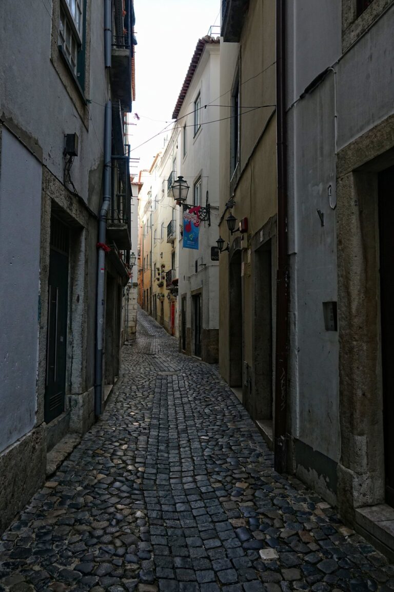 Photo of narrow street in Alfama in Lisbon, Portugal.