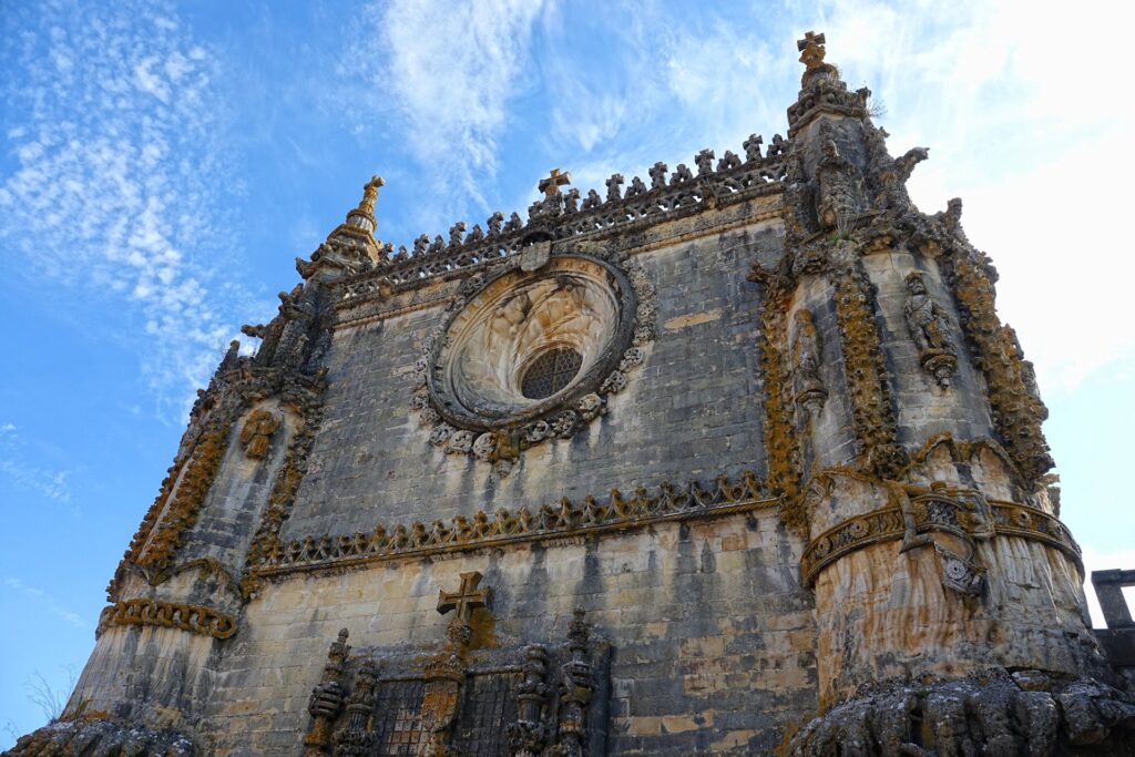 Photo of Manueline masterpiece, the west wall of the church at the Convent of Christ in Tomar, Portugal.