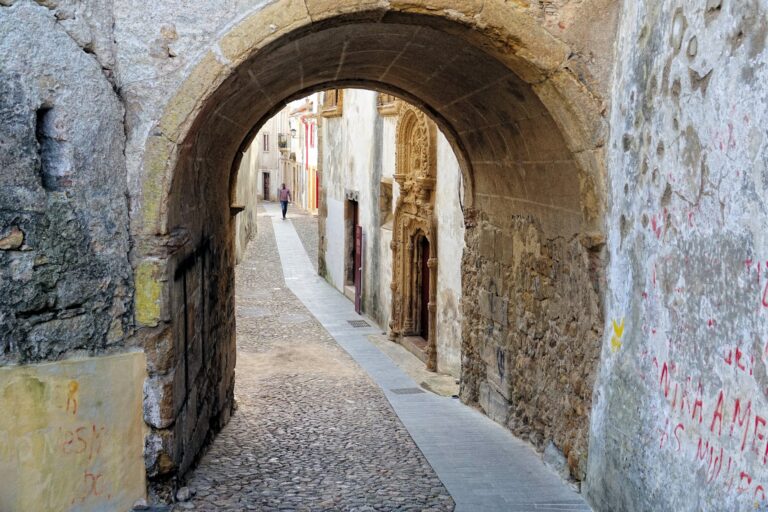 Photo of medieval street in the Old Town of Coimbra, Portugal.
