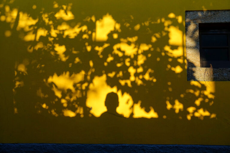 Photo of my own shadow on a wall along Caminho Portugues, near Ponte de Lima
