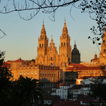 Photo of the Santiago de Compostela cathedral at sunset, seen from Alameda Park.