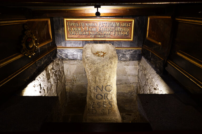 Photo of the Pedron stone on display under the altar in the parish church of Padron, Spain.