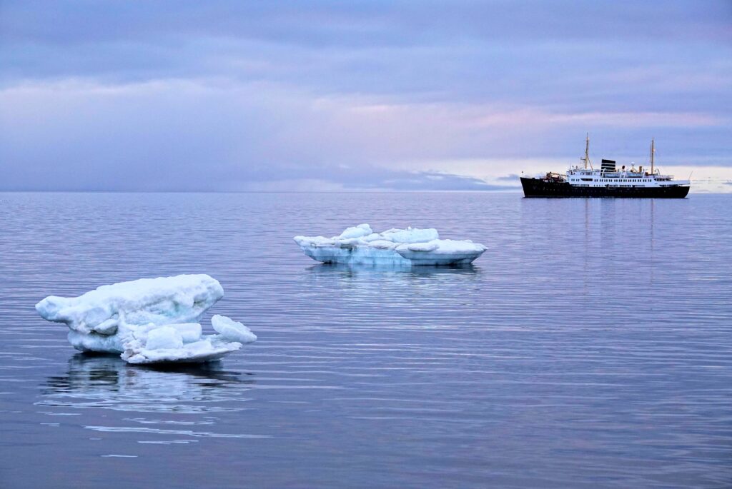 Photo of balance between nature and civilization in Svalbard, Norway