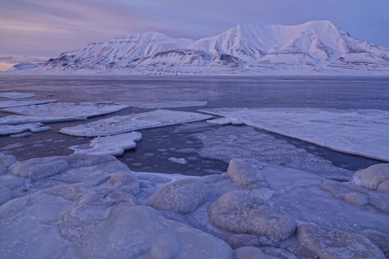 Photo of ice on the water during cold weather in Svalbard, Norway